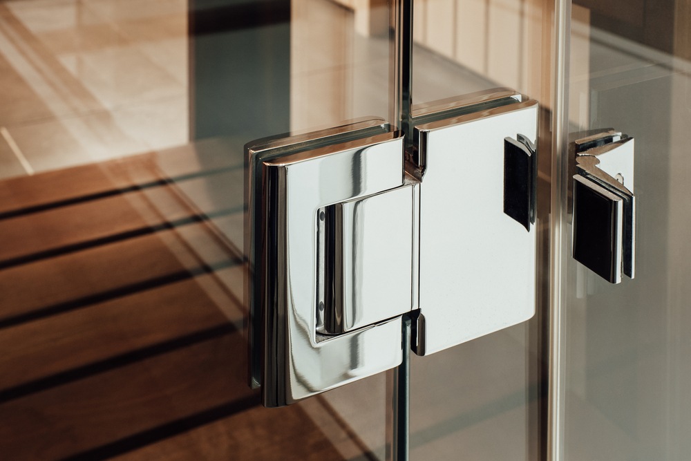 Shower door fittings