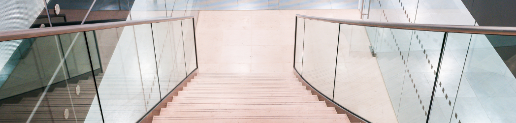 Glass balustrades on the stairs within an office building